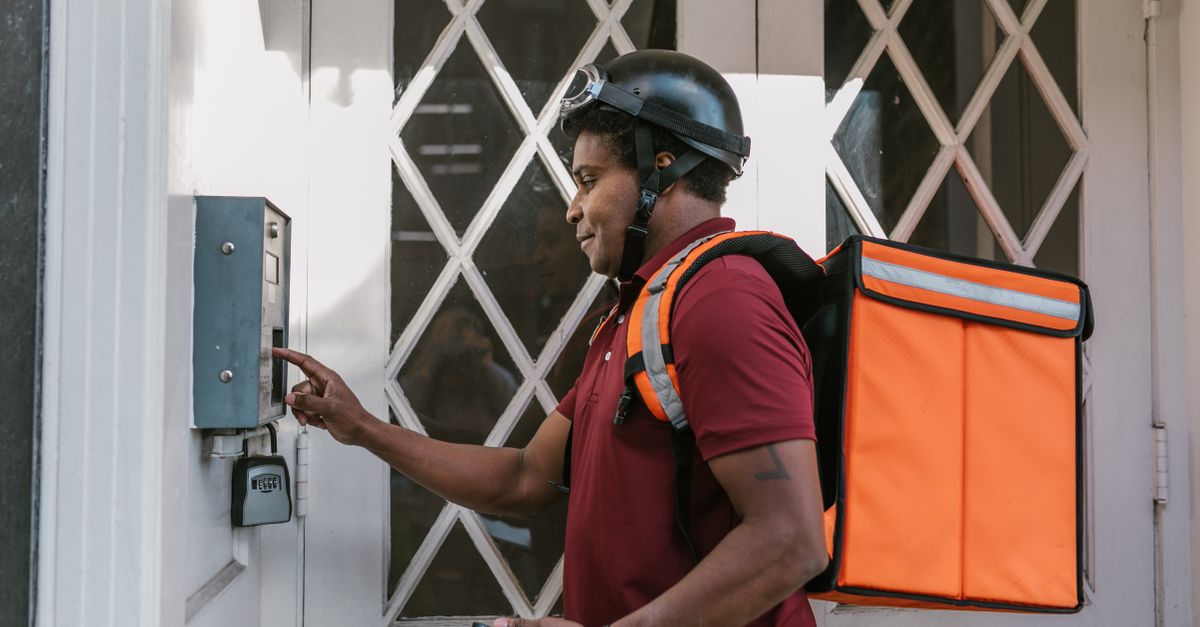 locksmith unlocking front door — Rapid Locksmith